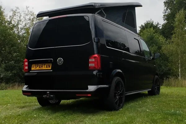 VW T6 LWB Deep Black campervan rear driver quarter view poptop up