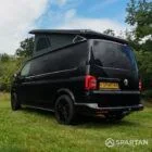 VW T6 LWB Deep Black campervan rear passenger quarter view poptop up