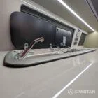 VW T6 LWB Deep Black campervan sink and hob in olive green and latte kitchen