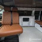 VW T6.1 Candy White & Copper Bronze campervan SPARTAN swivel front bench seat upholstered in toffee Bentley stitch