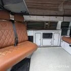VW T6.1 Candy White & Copper Bronze campervan SPARTAN swivel front bench seat upholstered in toffee Bentley stitch