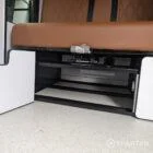 VW T6.1 Candy White & Copper Bronze campervan rock and roll bed with toffee Bentley-stitched upholstery