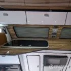 VW T6.1 Candy White & Copper Bronze campervan interior sink and hob close up with Nolche Marino worktop