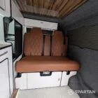 VW T6.1 Candy White & Copper Bronze campervan rock and roll bed with toffee Bentley-stitched upholstery