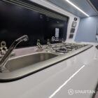 VW T6.1 Candy White & Squirrel Grey campervan interior sink and hob close up with Nolche Marino worktop