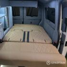 VW T6.1 Candy White & Squirrel Grey campervan rock and roll bed with liquor diamond-stitched upholstery