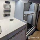 VW T6.1 Candy White & Squirrel Grey campervan control panel and wireless charger detail