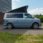 VW T6.1 SWB Squirrel Grey and Candy White campervan driver side on poptop up by Spartan Campers