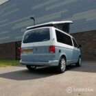 VW T6.1 SWB Squirrel Grey and Candy White campervan rear driver quarter poptop up by Spartan Campers