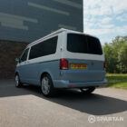 VW T6.1 SWB Squirrel Grey and Candy White campervan rear passenger quarter poptop down by Spartan Campers