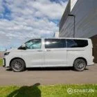 VW T7 Camper passenger-side view — new Volkswagen T7 conversion by Spartan Campers with full-length glazing, smart detailing, and modular interior layout.