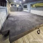 WV T7 day van interior with removable kitchen unit and mobiframe bed on rails