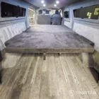 WV T7 day van interior with removable kitchen unit and mobiframe bed on rails