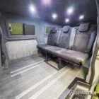 WV T7 day van interior with removable kitchen unit and mobiframe bed on rails
