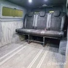 WV T7 day van interior with removable kitchen unit and mobiframe bed on rails
