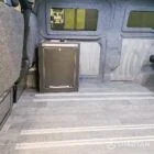 WV T7 day van interior with removable kitchen unit and mobiframe bed on rails