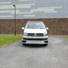 2018 VW T6 Spartan Conversion in two-tone Candy White and Ascot Grey, DSG automatic, parked on display.