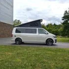 Side view of VW T6 2018 Spartan Conversion LWB campervan, showcasing clean two-tone paint and body styling.