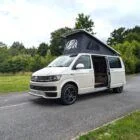 2018 VW T6 Spartan Conversion in two-tone Candy White and Ascot Grey, DSG automatic, parked on display.