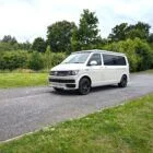 2018 VW T6 Spartan Conversion in two-tone Candy White and Ascot Grey, DSG automatic, parked on display.