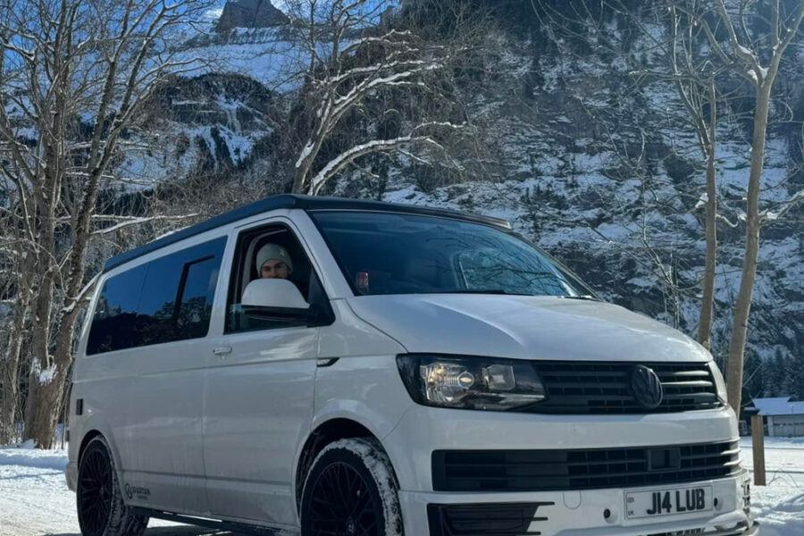 Spartan campervan in snowy mountains
