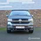 VW T6.1 Transporter in Indium Grey with a Spartan campervan conversion, parked outdoors with clean lines and a practical touring profile.