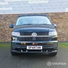 VW T6.1 Transporter campervan in gloss black with a spartan conversion from the front