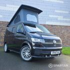 VW T6.1 Transporter campervan in gloss black with a spartan conversion from the front