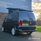 VW T6.1 Transporter campervan in gloss black with a spartan conversion from the rear