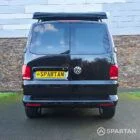 VW T6.1 Transporter campervan in gloss black with a spartan conversion from the rear