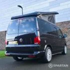 VW T6.1 Transporter campervan in gloss black with a spartan conversion from the rear