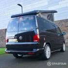 VW T6.1 Transporter campervan in gloss black with a spartan conversion from the rear