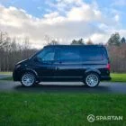 VW T6.1 Transporter campervan in gloss black with a spartan conversion from the side
