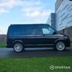 VW T6.1 Transporter campervan in gloss black with a spartan conversion from the side