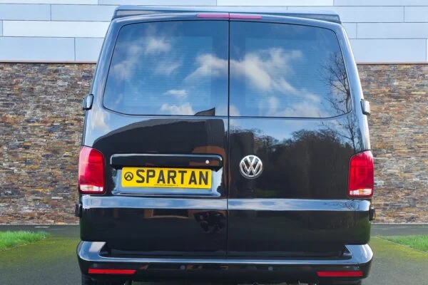 VW T6.1 Transporter campervan in gloss black with a spartan conversion from the rear