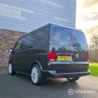 VW T6.1 Transporter campervan in gloss black with a spartan conversion from the rear