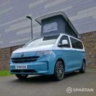 VW Transporter T7 campervan, with full Spartan Campers conversion. Passenger front quarter with pop top up
