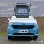 VW Transporter T7 campervan, with full Spartan Campers conversion. Front on with pop top up