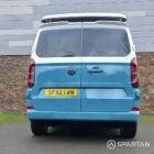 VW Transporter T7 campervan, with full Spartan Campers conversion. Rear with pop top up