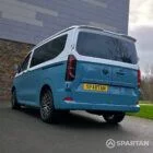 VW Transporter T7 campervan, with full Spartan Campers conversion. Rear passenger quarter with pop top down
