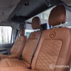 VW T7 Transporter with Spartan campervan conversion with drivers seat and front double bench seat upholstered in fudge