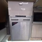 VW T7 Transporter with Spartan campervan conversion living space showcasing the fridge freezer