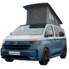 VW Transporter T7 campervan in two tone white and bamboo with pop-top roof, passenger-side front quarter view.