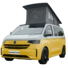 VW Transporter T7 campervan in two tone faro yellow and white with pop-top roof, passenger-side front quarter view.