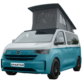 VW Transporter T7 campervan in two tone Neptune blue with pop-top roof, passenger-side front quarter view.