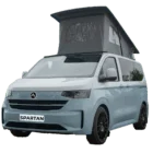 VW Transporter T7 campervan in two tone squirrel grey with pop-top roof, passenger-side front quarter view.
