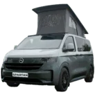 VW Transporter T7 campervan in two tone indium grey with pop-top roof, passenger-side front quarter view.