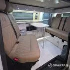 Spartan campers VW campervan conversion with winter floor, latte and Winchester oak kitchen and liquor upholstery. seats 5 sleeps 4