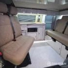 Spartan campers VW campervan conversion with winter floor, latte and Winchester oak kitchen and liquor upholstery. fully fitted with kitchen and 4 birth