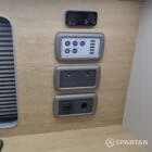 Spartan campers VW campervan conversion with winter floor, latte and Winchester oak kitchen and liquor upholstery. Fitted with a comfort control panel